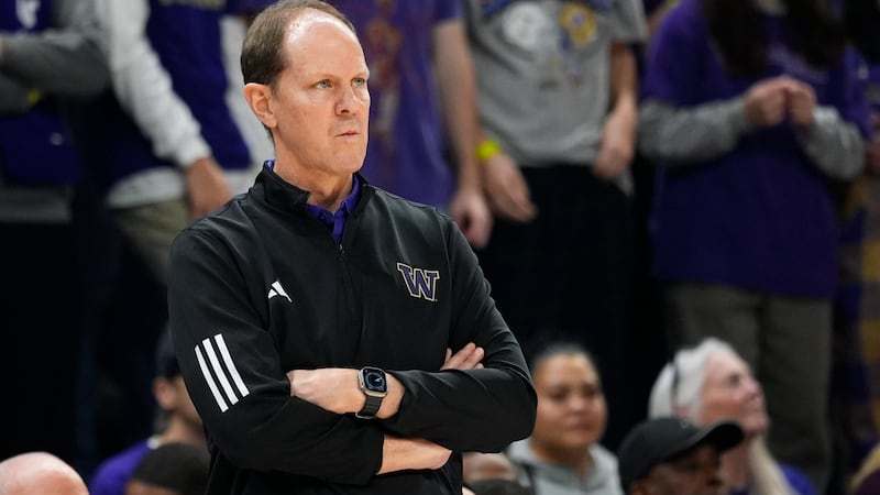 Washington head coach Mike Hopkins looks on from the sideline during the second half of an...