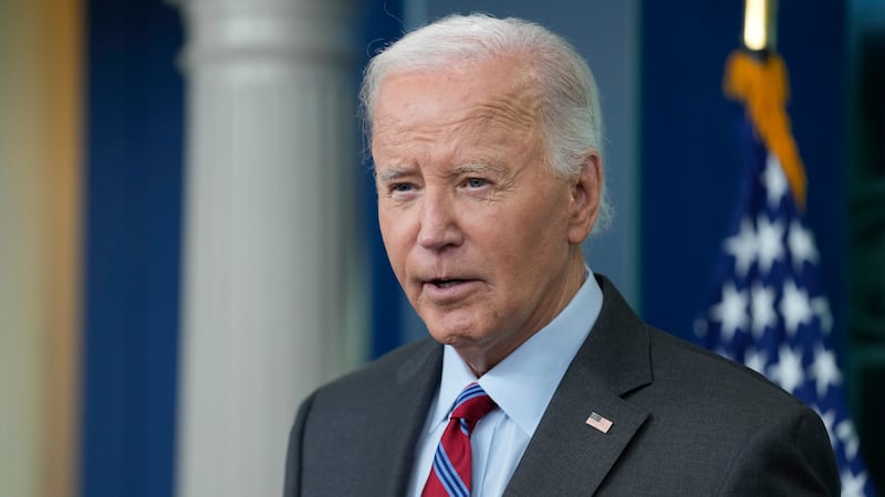 President Joe Biden speaks during a surprise appearance to take questions during the daily...