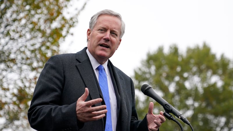 FILE - White House chief of staff Mark Meadows speaks with reporters outside the White House,...