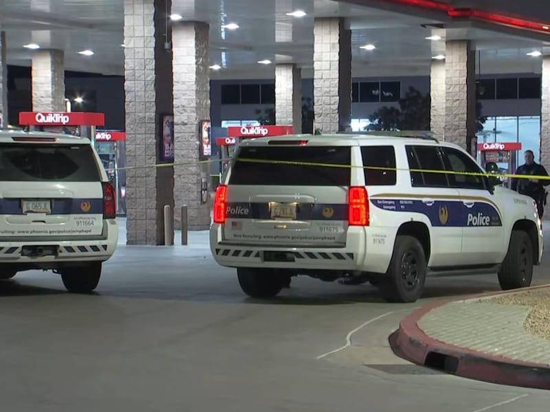 Police respond after a person was stabbed at a north Phoenix gas station.