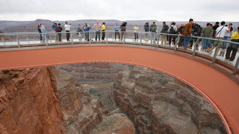 In this March 20, 2007 file photo, people walk on the Skywalk during the first walk event at...