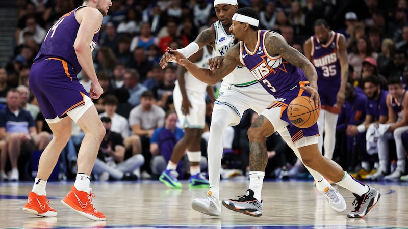 Phoenix Suns guard Bradley Beal (3) works around Minnesota Timberwolves forward Jaden...