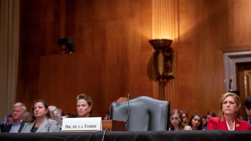 The chair reserved for Steward Health Care System CEO Ralph de la Torre sits empty after de la...
