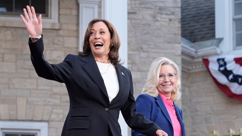 Democratic presidential nominee Vice President Kamala Harris, left, arrives to speak at a...
