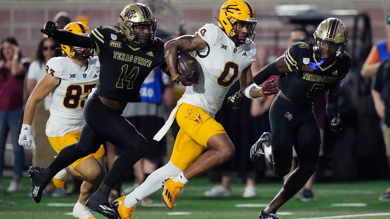 Arizona State wide receiver Jordyn Tyson (0) runs for a touchdown after making a catch against...