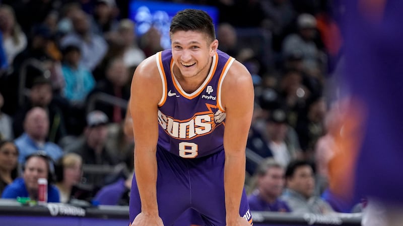 Phoenix Suns guard Grayson Allen (8) smiles after hitting his sixth 3-pointer in during the...