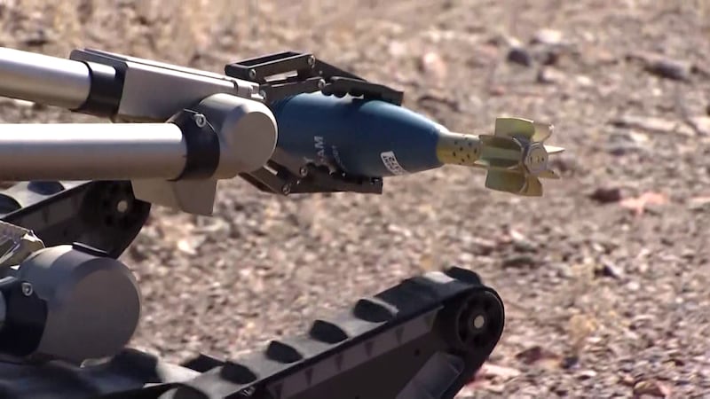 The robots can pick up a test mine and take it to a place where it can be disposed of safely.