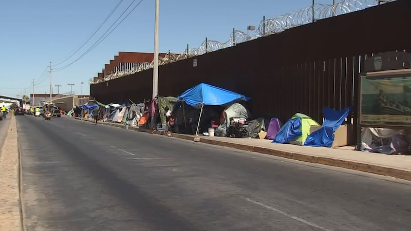 Asylum seekers are camping outside the port of entry as they wait for permission to cross the...